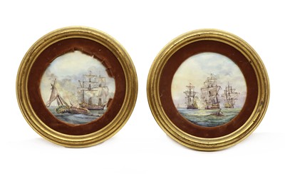 Lot 75 - A pair of painted porcelain roundels