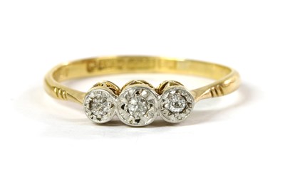 Lot 156 - A gold three stone diamond ring