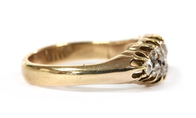 Lot 10 - A gold diamond set boat shaped ring