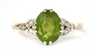 Lot 246 - A gold single stone peridot ring