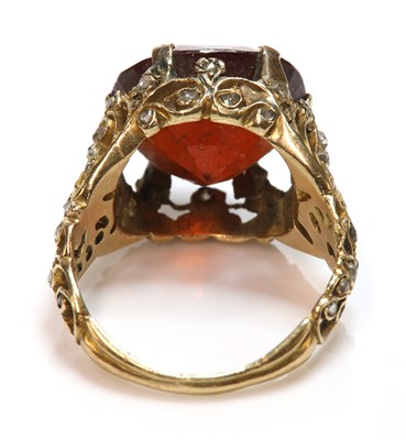 Lot 208 - A single stone hessonite garnet ring
