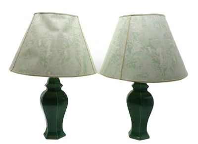 Lot 107 - A pair of green-glazed Chinese-style table lamps