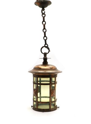 Lot 106 - An Arts and crafts copper and vaseline glass lantern