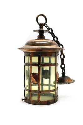 Lot 106 - An Arts and crafts copper and vaseline glass lantern