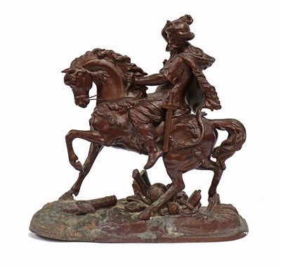 Lot 132 - A patinated spelter figure of a hunter