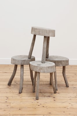 Lot 533 - A set of four rustic tree slice stools