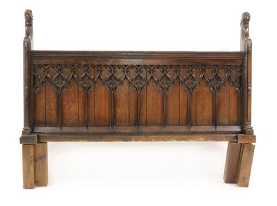 Lot 491 - A Gothic oak pew bedhead