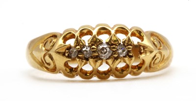 Lot 15 - An 18ct gold diamond boat shaped ring