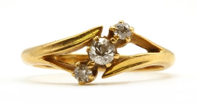 Lot 70 - An 18ct gold three stone diamond ring