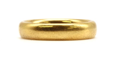 Lot 61 - A 22ct gold court section wedding ring