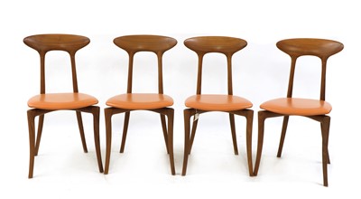 Lot 492 - A set of four walnut dining chairs by Ceccoti Colezzioni