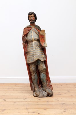 Lot 808 - A carved and polychrome-painted figure of a knight