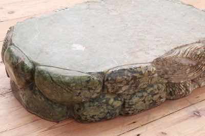 Lot 412 - A carved hardstone plinth