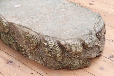 Lot 412 - A carved hardstone plinth