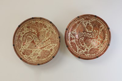 Lot 509 - A near pair of Hispano-Moresque pottery chargers