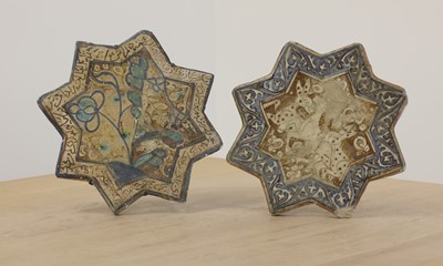 Lot 144 - A star-shaped lustre-glazed tile