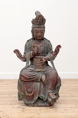 Lot 750 - A large carved wooden figure of Guanyin