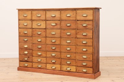 Lot 609 - A pine bank of drawers
