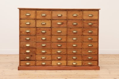 Lot 609 - A pine bank of drawers