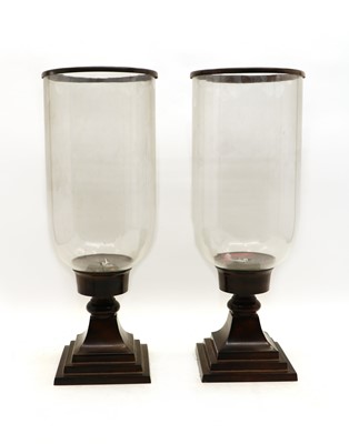 Lot 111 - A pair of Besselink and Jones hurricane lamps