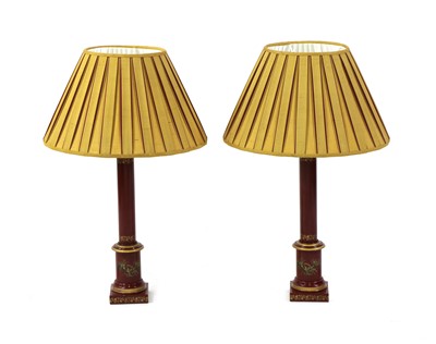 Lot 112 - A pair of toleware type Besselink and Jones column lamps