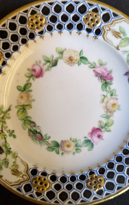 Lot 61 - A Kerr & Binns Worcester reticulated porcelain cup and saucer