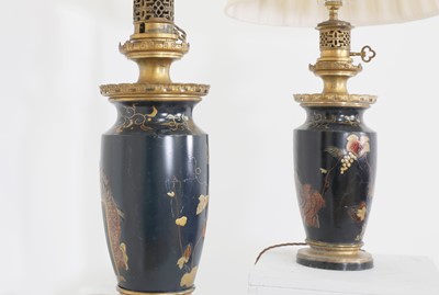 Lot 39 - A pair of Orientalist patinated and gilt metal moderator lamps