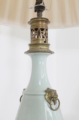 Lot 41 - A pair of Napoleon III celadon-glazed pottery table lamps