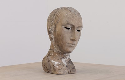 Lot 483 - A Colonial Santos carved model of a head