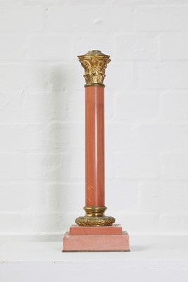 Lot 88 - A rouge marble table lamp