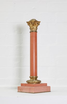 Lot 88 - A rouge marble table lamp