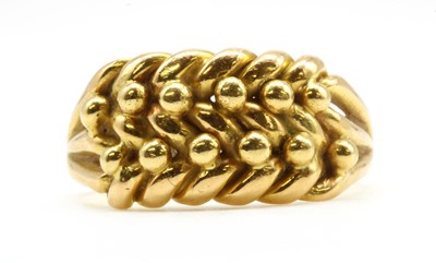 Lot 20 - An 18ct gold keeper ring