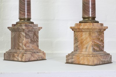 Lot 225 - A pair of veined pink marble lamp bases