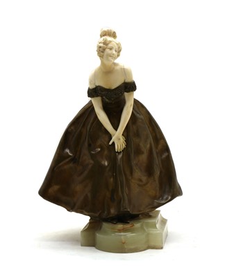 Lot 195 - An Art Deco bronze and ivory lady