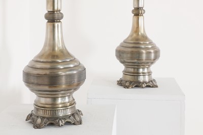 Lot 101 - A pair of Napoleon III silver-plated moderator oil lamps