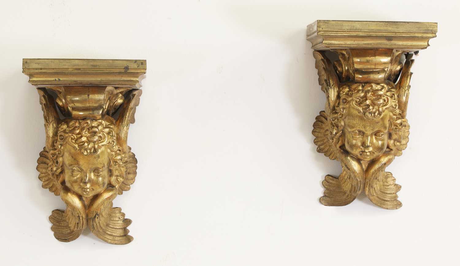 Lot 234 - A pair of gilt-bronze wall brackets