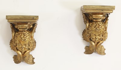 Lot 234 - A pair of gilt-bronze wall brackets
