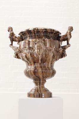 Lot 27 - A massive flambé-glazed faience urn
