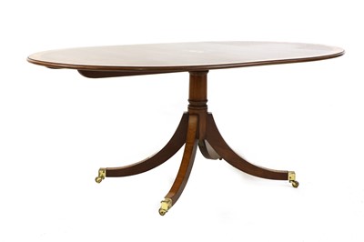 Lot 354 - A Regency style mahogany and satinwood crossbanded dining table