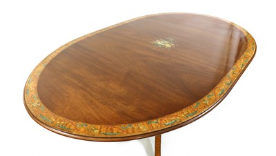 Lot 354 - A Regency style mahogany and satinwood crossbanded dining table