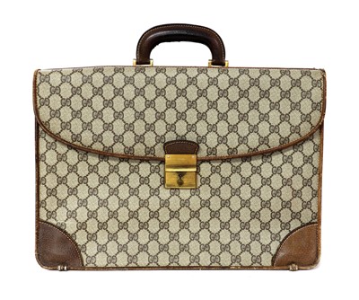 Lot 399 - A vintage Gucci brown coated canvas briefcase