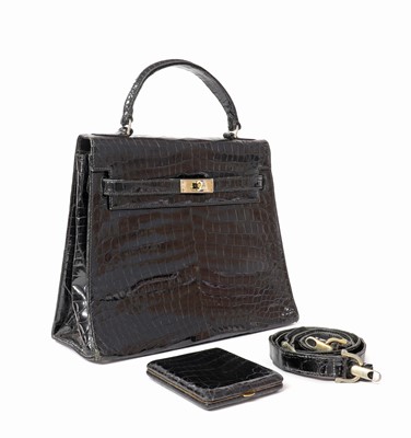 Lot 365 - A vintage Asprey 'kelly' crocodile leather bag