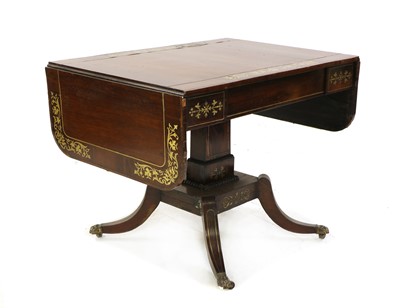 Lot 435 - A Regency rosewood and brass inlaid sofa table