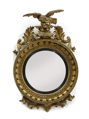 Lot 337 - A Regency design giltwood convex mirror