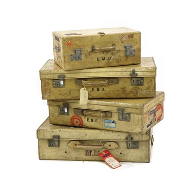 Lot 373 - A graduated set of three vellum suitcases