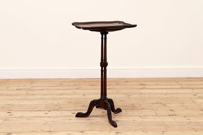 Lot 586 - A rosewood tripod table