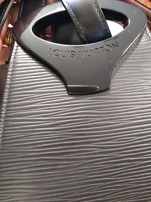 Lot 385 - Louis Vuitton black Epi leather single strap backpack