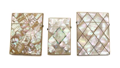 Lot 244 - A near pair of Victorian mother of pearl veneered card cases