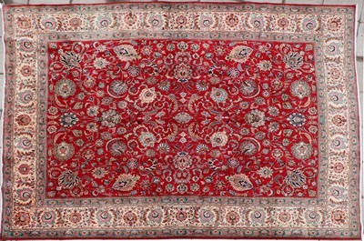 Lot 434 - A Tabriz wool carpet