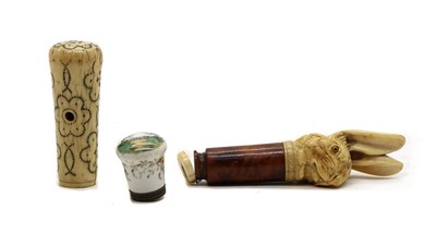 Lot 237 - An ivory and pique work walking cane handle